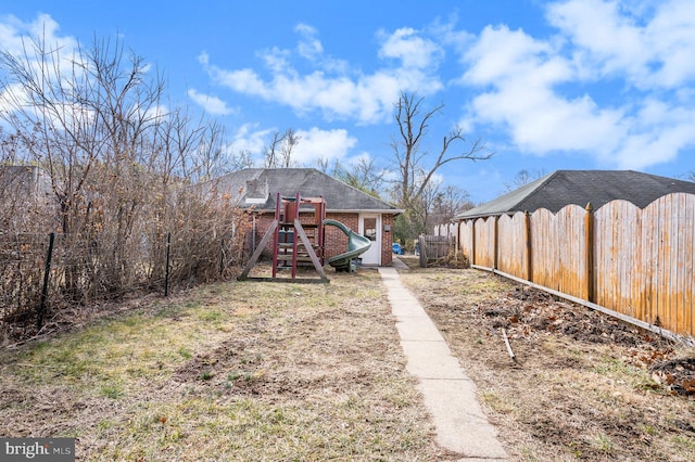 view of yard with a playground