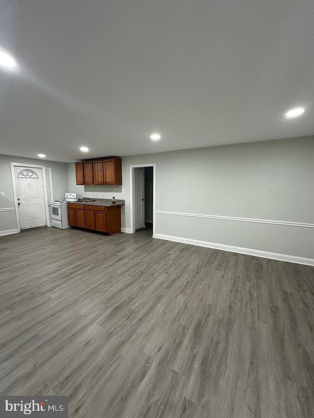 unfurnished living room featuring light wood-type flooring