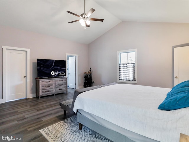 bedroom featuring ceiling fan, vaulted ceiling, and dark hardwood / wood-style flooring