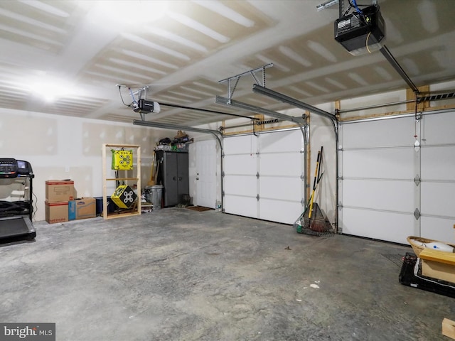 garage featuring a garage door opener