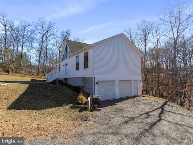 view of home's exterior featuring a garage