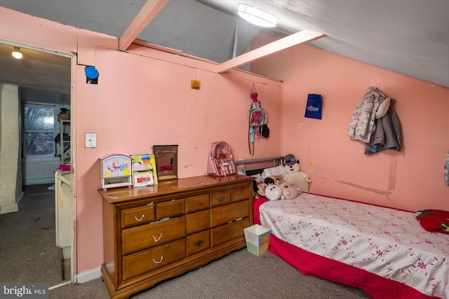 bedroom featuring carpet flooring and lofted ceiling