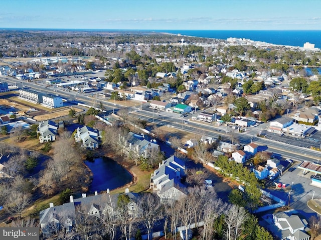 aerial view with a water view and a residential view