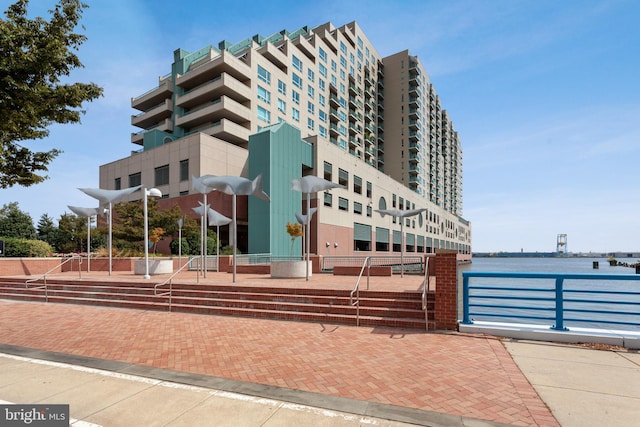 view of property with a water view