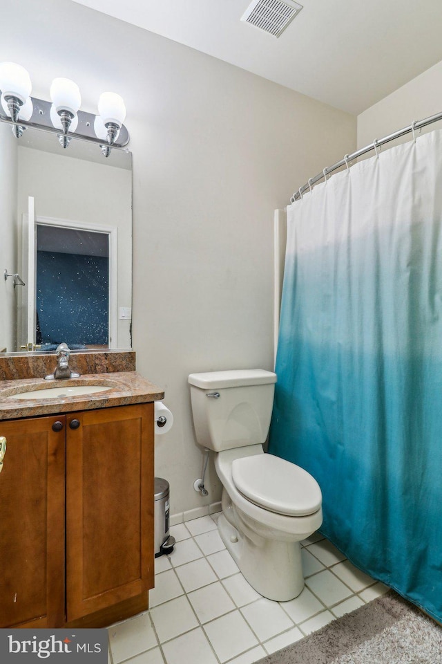 full bath with visible vents, vanity, toilet, and tile patterned floors