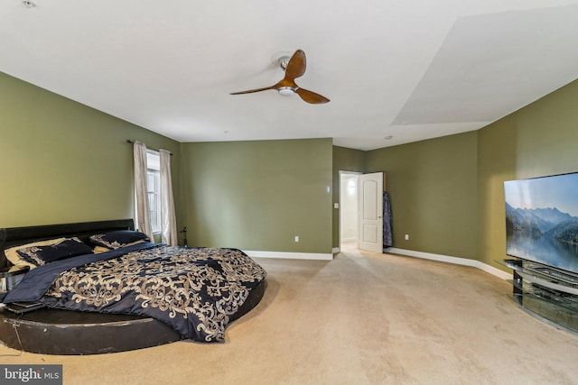 bedroom featuring carpet flooring, ceiling fan, and baseboards