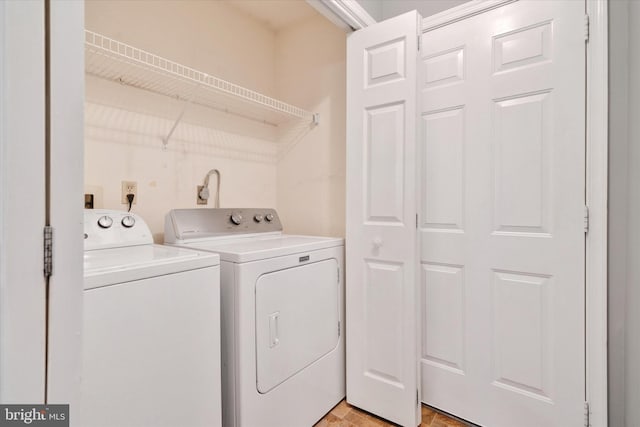 laundry area featuring laundry area and washer and dryer