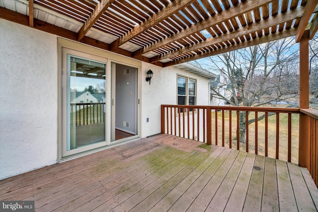 wooden terrace with a pergola