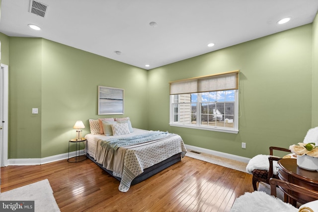 bedroom featuring hardwood / wood-style floors