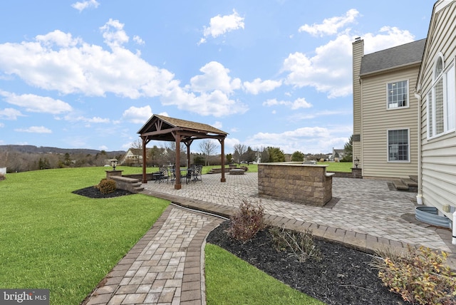 exterior space with a gazebo, a yard, and a patio