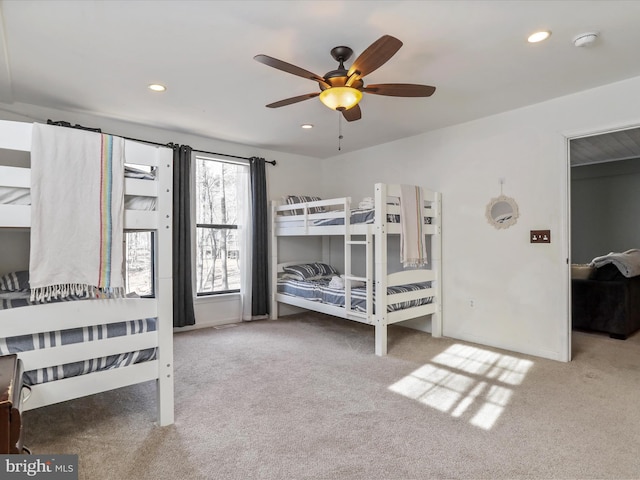 bedroom featuring a ceiling fan, recessed lighting, carpet flooring, and baseboards