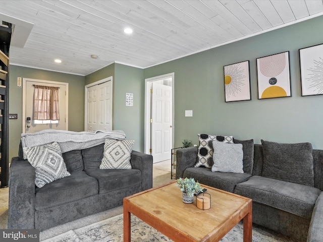 living area featuring ornamental molding, wooden ceiling, and recessed lighting