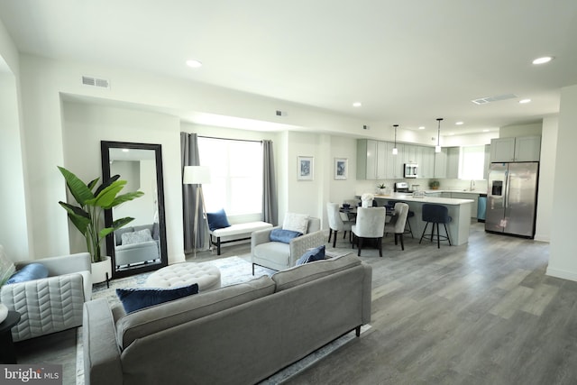3312 N Market St, Wilmington, DE 19802 - living room featuring wood finished floors, recessed lighting, and baseboards