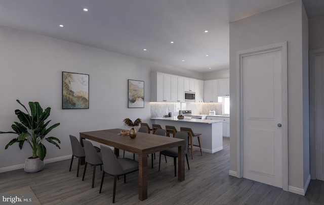 dining room featuring dark wood-type flooring