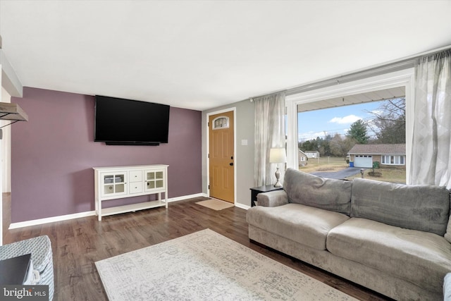 living room with dark hardwood / wood-style floors