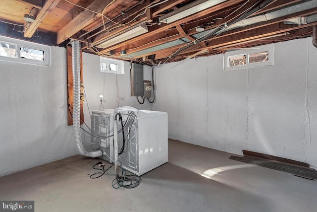 basement featuring washer / clothes dryer and electric panel