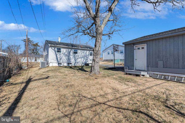 view of yard featuring central AC