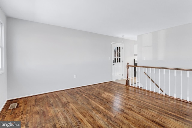 empty room featuring hardwood / wood-style floors