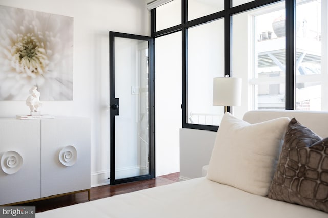 bedroom with wood finished floors