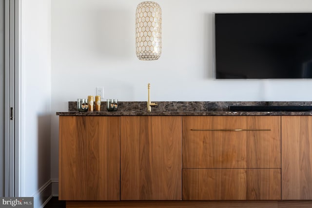 bar featuring a sink