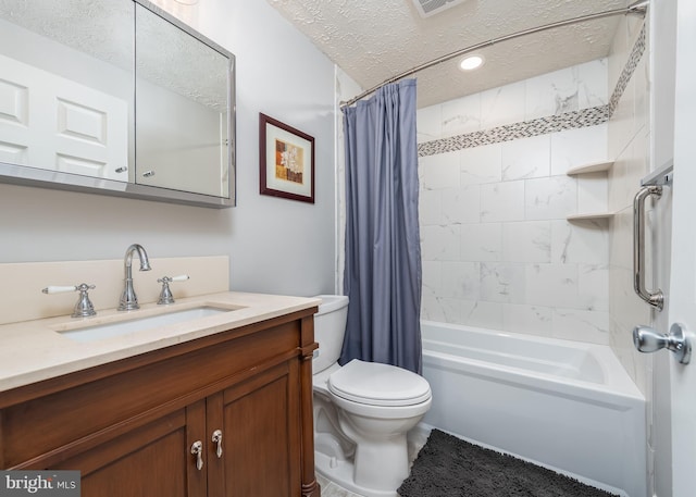 full bathroom with toilet, vanity, a textured ceiling, and shower / tub combo with curtain