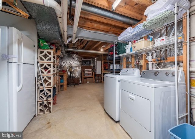 laundry area with washer and clothes dryer