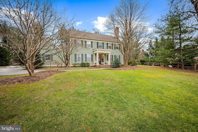 view of front of home with a front lawn