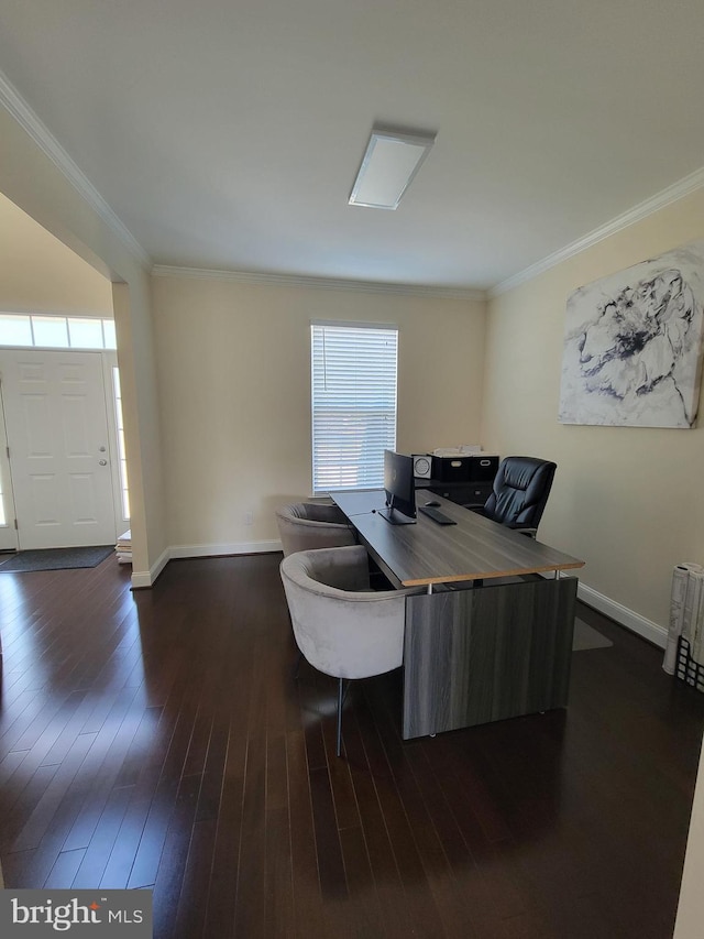 office space featuring ornamental molding and dark hardwood / wood-style flooring