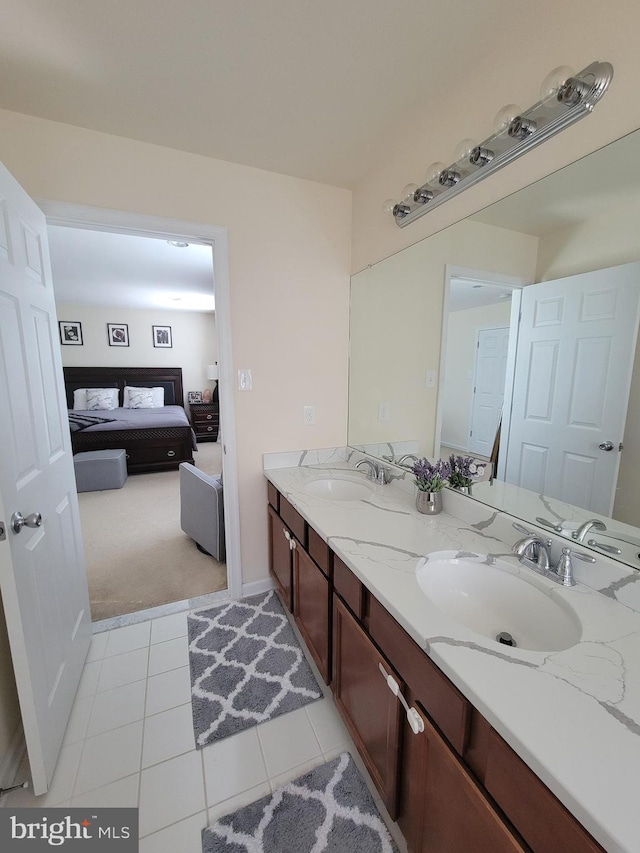 bathroom with vanity and tile patterned floors