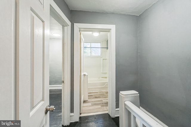 bathroom with wood-type flooring