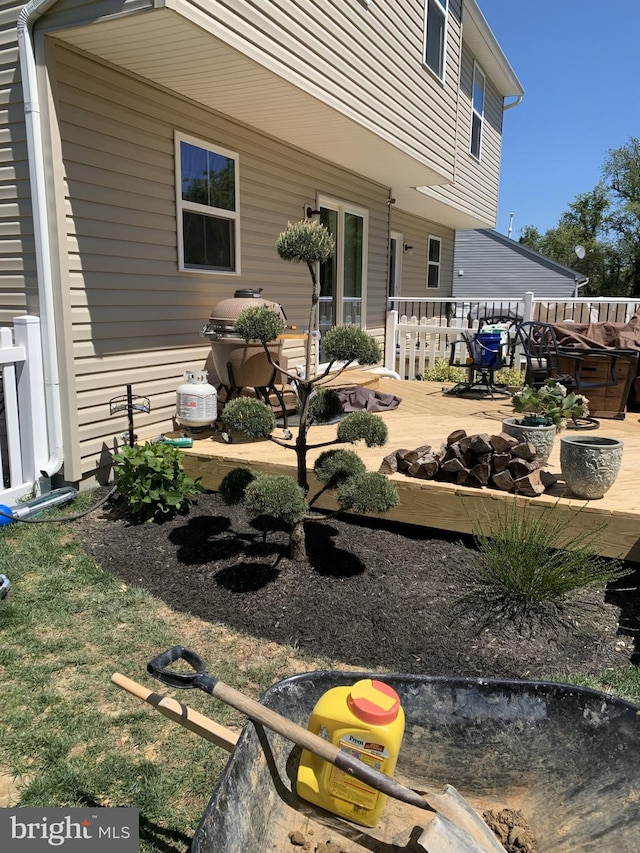 exterior space with a hot tub and a patio