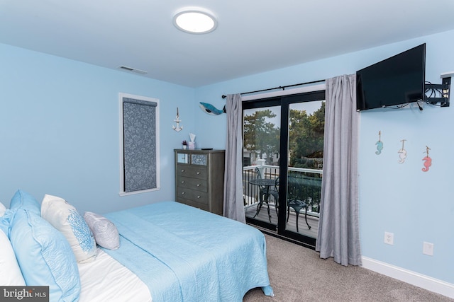 carpeted bedroom with access to exterior, baseboards, and visible vents