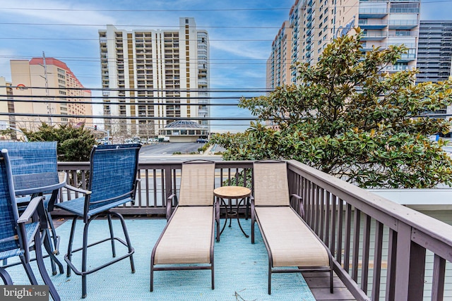 balcony featuring a city view