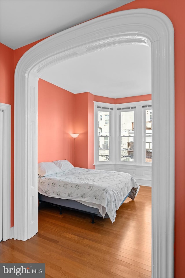 bedroom featuring wood finished floors