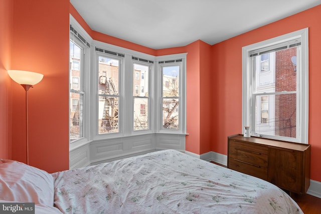 bedroom featuring baseboards