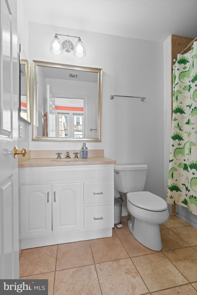 full bathroom with visible vents, tile patterned flooring, vanity, and toilet