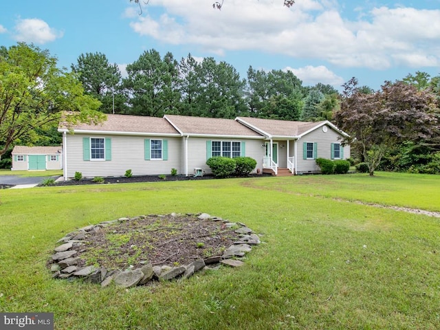 ranch-style house featuring a front yard