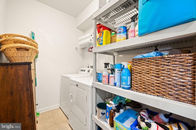 laundry room with washing machine and clothes dryer