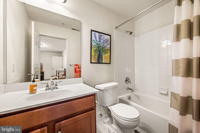 full bathroom with shower / tub combo with curtain, toilet, and vanity