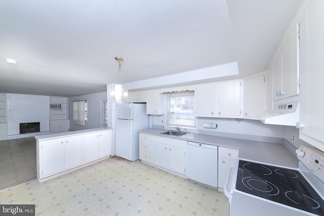 kitchen featuring white appliances, extractor fan, decorative light fixtures, sink, and white cabinetry