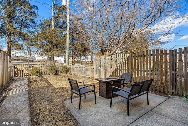 view of patio featuring a fire pit