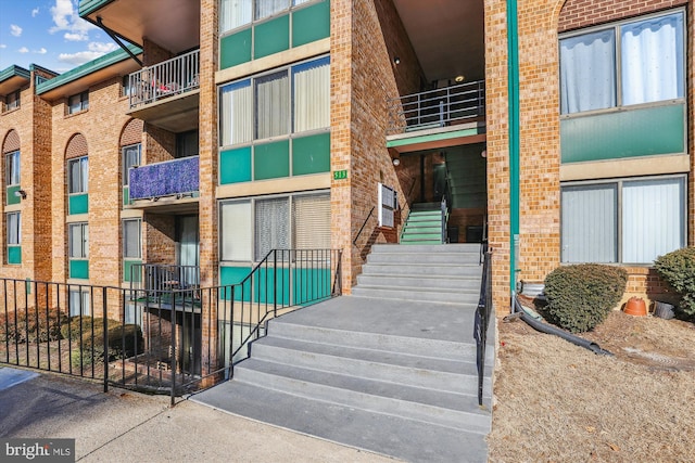 view of building exterior with stairs