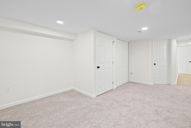 basement with light carpet