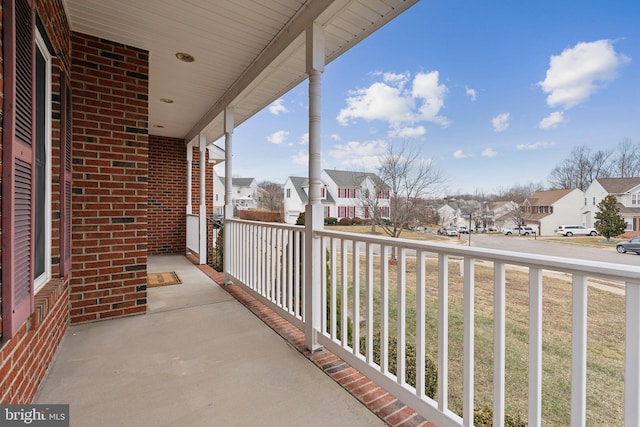 balcony featuring covered porch