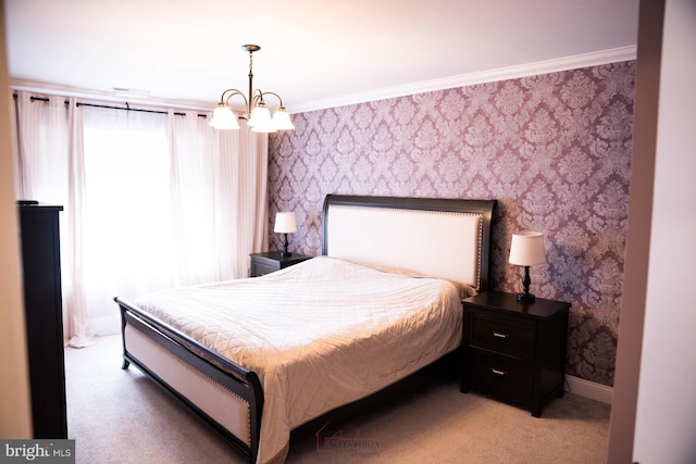 carpeted bedroom with crown molding and an inviting chandelier