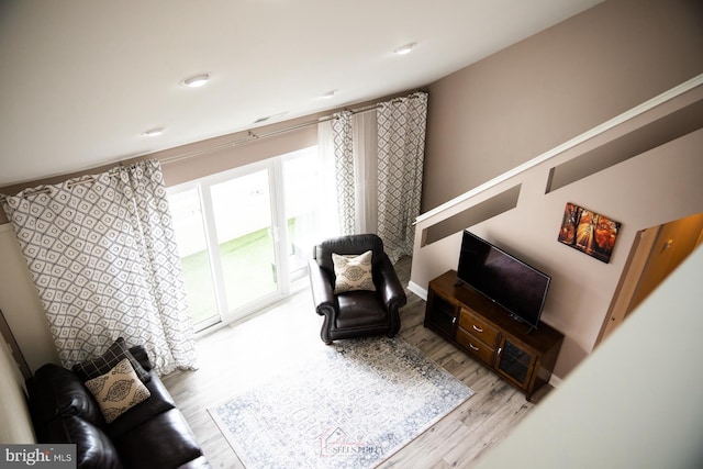 living area featuring light hardwood / wood-style floors