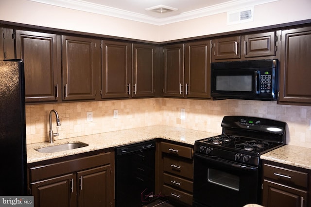 kitchen featuring sink, black appliances, crown molding, and dark brown cabinets