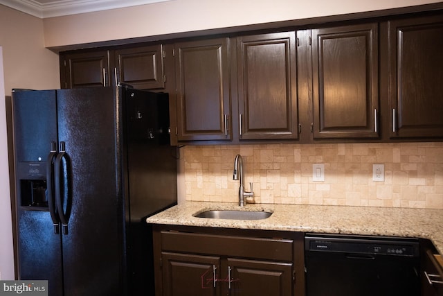 kitchen with dark brown cabinets, sink, and black appliances