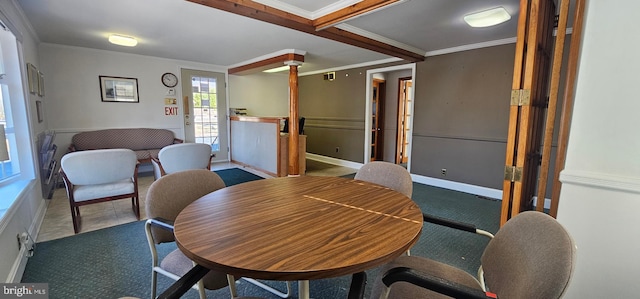 dining area with crown molding