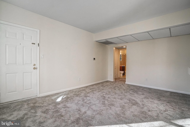 empty room featuring carpet floors